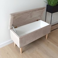 Otwierana ławka tapicerowana z pojemnikiem.