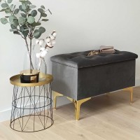 Ławka do przedpokoju z welurowym siedziskiem.