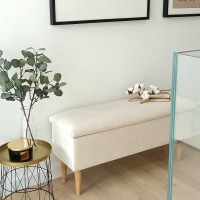 Ławka do przedpokoju z tapicerowanym siedziskiem.