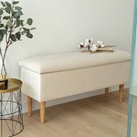 Szafka na buty z siedziskiem tapicerowanym.