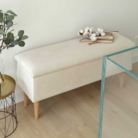 Pufa ze schowkiem do przedpokoju w kolorze beżowym.