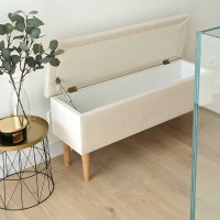 Elegancka szafka na buty z beżowym siedziskiem.